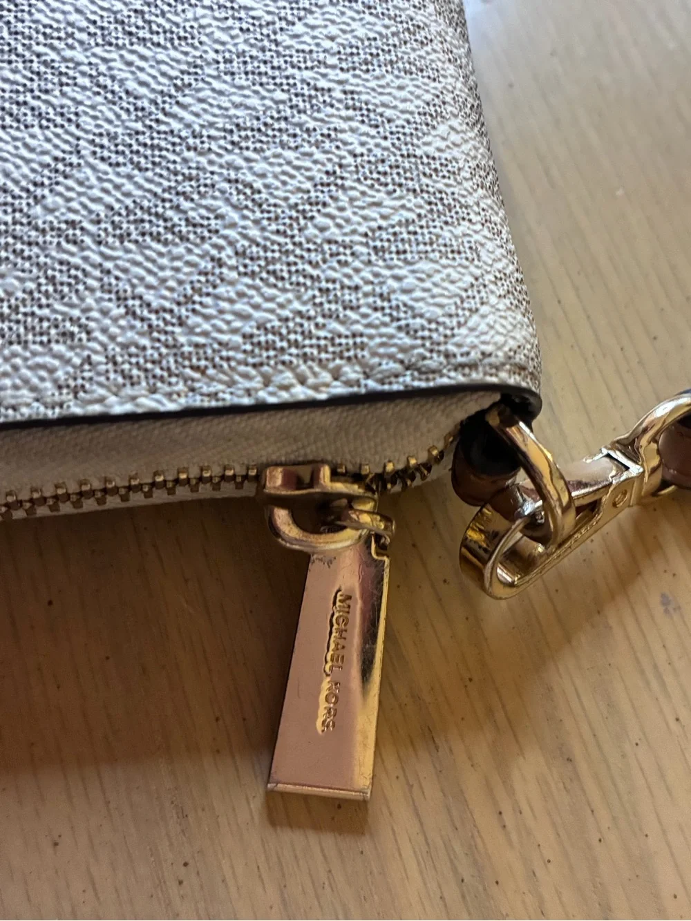 Michael Kors Silver Metallic Logo Zip Wristlet with Brown Strap